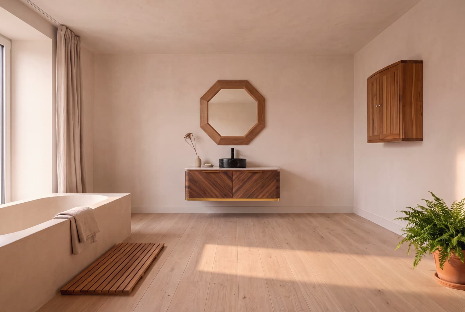 A light, warm, saturated bathroom relies on a quiet architectural envelope to create an atmosphere of rest.